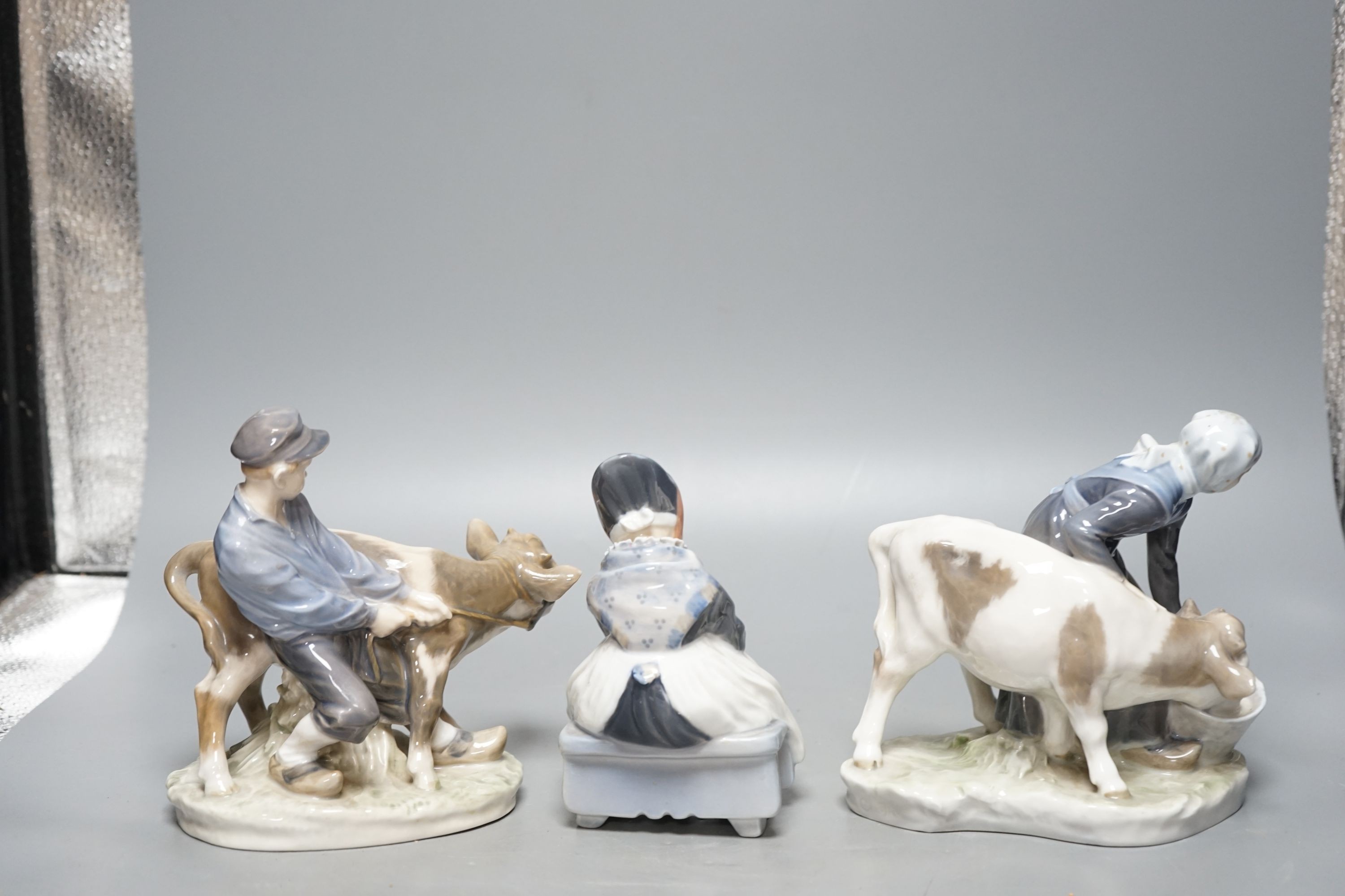 Three Royal Copenhagen figures of children, model number is 779, 772 and 1314, Taller 17 cm